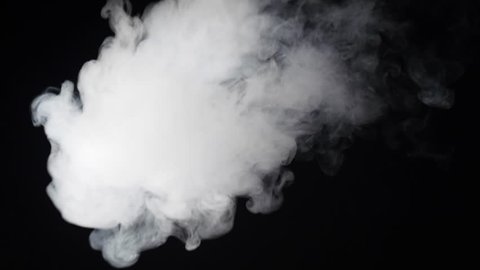 Man smoking electronic cigarette vapor on black background