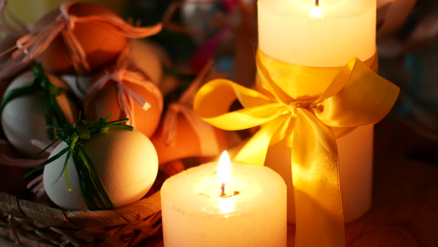 Easter decoration. Burning candles and eggs. Royalty-Free Stock Footage #1006621456