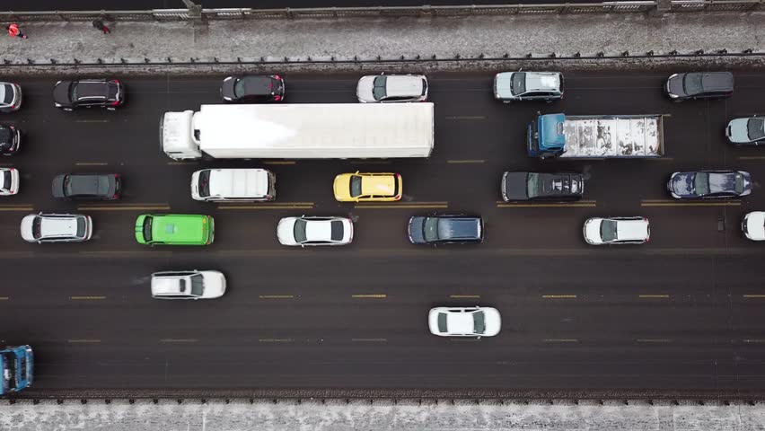Aerial view of car traffic on the Paton bridge in Kiev, Ukraine. Car traffic jam. Royalty-Free Stock Footage #1006628458