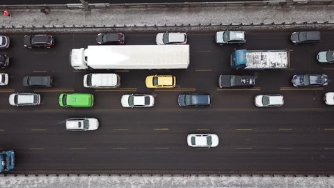 Aerial view of car traffic on the Paton bridge in Kiev, Ukraine. Car traffic jam.