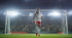 Soccer player show his skils on a professional soccer stadium. Stadium and crowd is made in 3D and animated