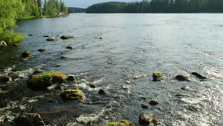 Stones and streaming water of Siikakoski rapid in Konnevesi, Finland.