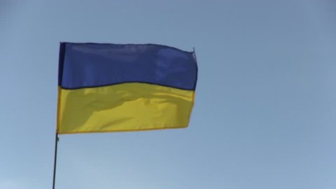 Ukraine flag on blue sky