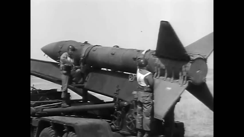 CIRCA 1957\xD1Officers of the 101st Airborne Division load anti aircraft weapons before battle.