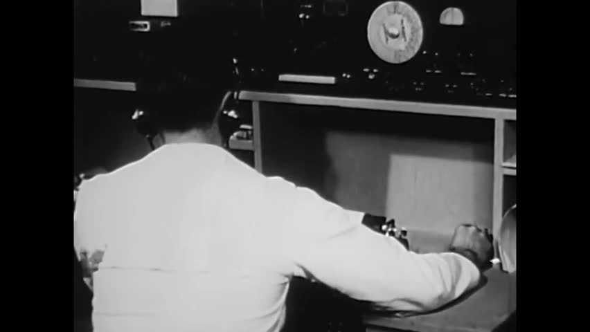 CIRCA 1944\xD1 A Navy radioman showcases Morse Code equipment. Royalty-Free Stock Footage #1006646689