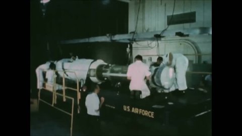 CIRCA 1963 - A blue scout missile is prepared and launched into space.