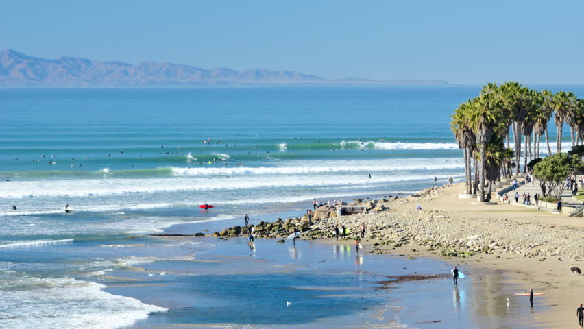 CIRCA 2010s - Time lapse of surfers in the waves at Surfers Point, Ventura, California.