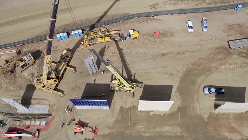 CIRCA 2010s - Aerial views of the Border Wall prototype construction near Otay Mesa, California.
