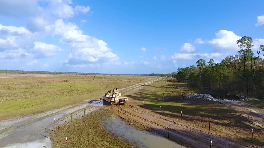 CIRCA 2010s - Aerial of NATO tank in a field in Europe.