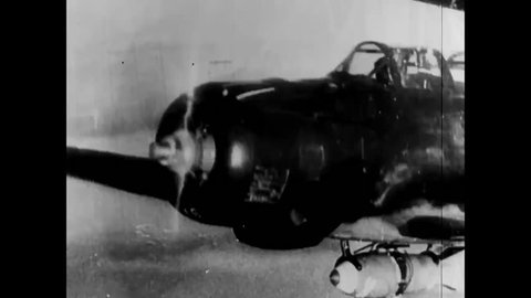 CIRCA - 1941 - Japanese airplanes bomb Pearl Harbor, Hawaii, and retreat on battleships to Japan.