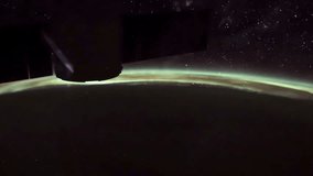 ISS view of rotating planet earth with aurora and star galaxy. Created from Public Domain images, courtesy of NASA JSC : http://eol.jsc.nasa.gov. 