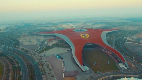 ABU DHABI, UAE - DECEMBER 2016: Aerial view of Ferrari World. Abu Dhabi attracts 10 million people annually.