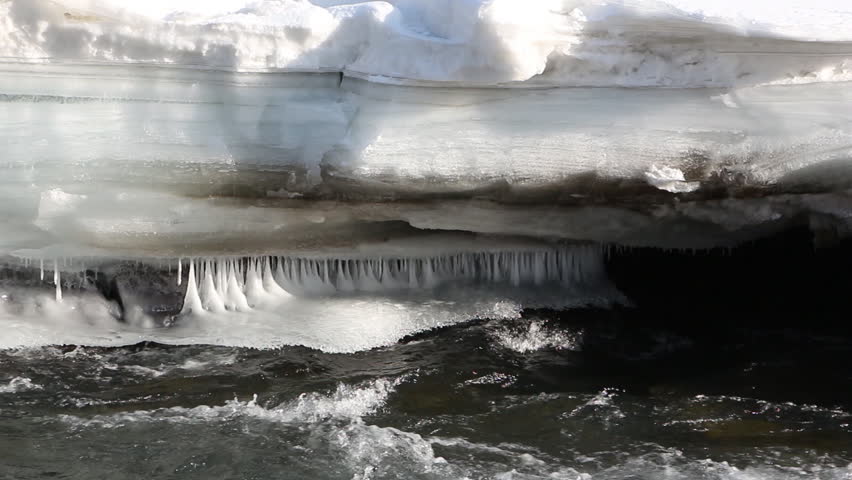 Ice melting on the river in early spring, Chemal River, Altai, Russia 