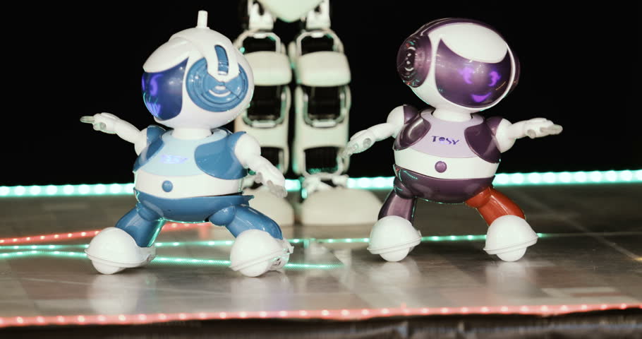 Танец роботов на играх будущего. Робот танцует. Танец робота. Танец робота для детей. NFY Танцующий робот.