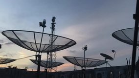 A sunset timelapse with a satellite dish background - Powered by Shutterstock - Get 15% off with code: PIKWIZARD15