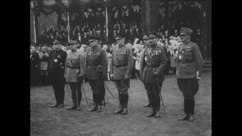 CIRCA 1918 - Generals Pershing, Petain, Joffre and Field Marshals Foch and Haig are greeted by President Poincare in France in World War 1.