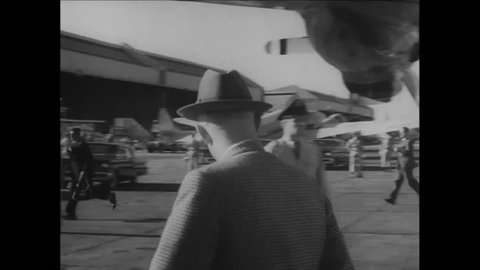 CIRCA 1957 - President Eisenhower is filmed getting off the USAF plane Columbine at a Washington DC airport.