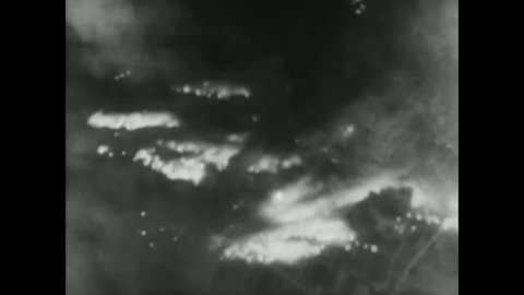 CIRCA 1944 - The 21st Bomber Command bombs Tokyo, Japan at night in World War 2.
