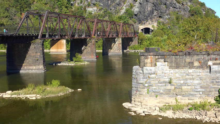 HARPERS FERRY, WEST VIRGINIA - CIRCA 2010s - River rafting at the confluence of the Potomac and Shenandoah Rivers at Harpers Ferry, West Virginia.