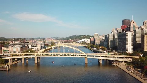 PITTSBURGH, PENNSYLVANIA - CIRCA 2010s - Beautiful aerial over bridges on the Monongahela River to Pittsburgh, Pennsylvania downtown skyline.