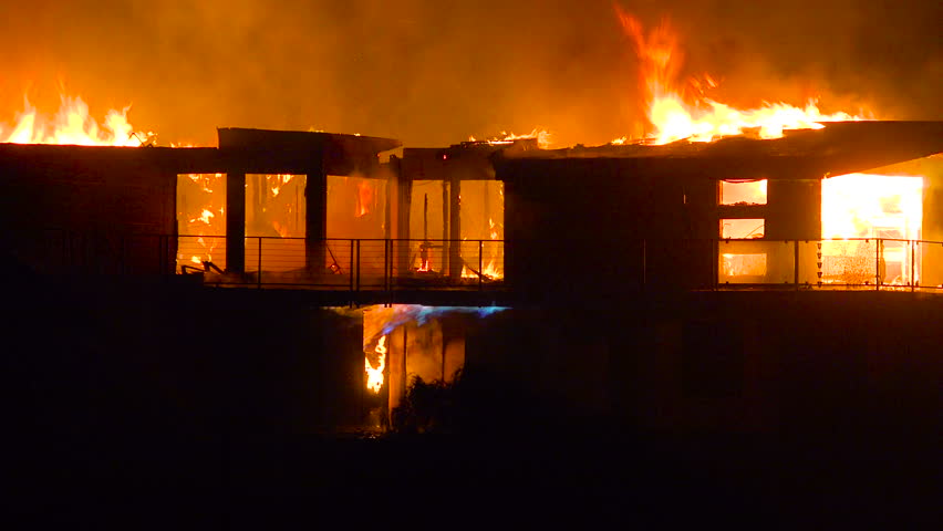 VENTURA, CALIFORNIA - CIRCA 2010s - A large home burns at night during the 2017 Thomas fire in Ventura County, California. | Shutterstock HD Video #1006712140