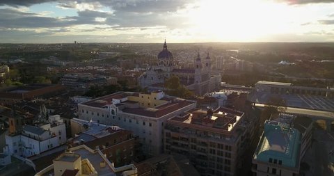Aerial drone view of Royal Palace of Madrid, Spain at sunset