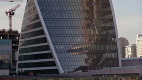 The building of glass and concrete unusual swirling shapes - Powered by Shutterstock - Get 15% off with code: PIKWIZARD15