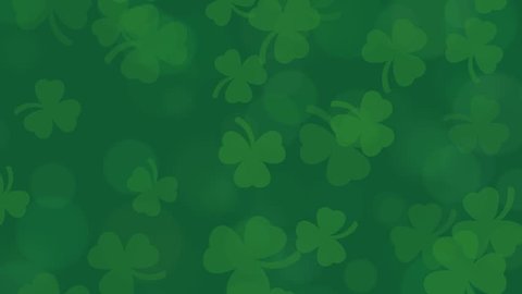 St Patrick's Day animated shamrocks on a deep green bokeh background.
