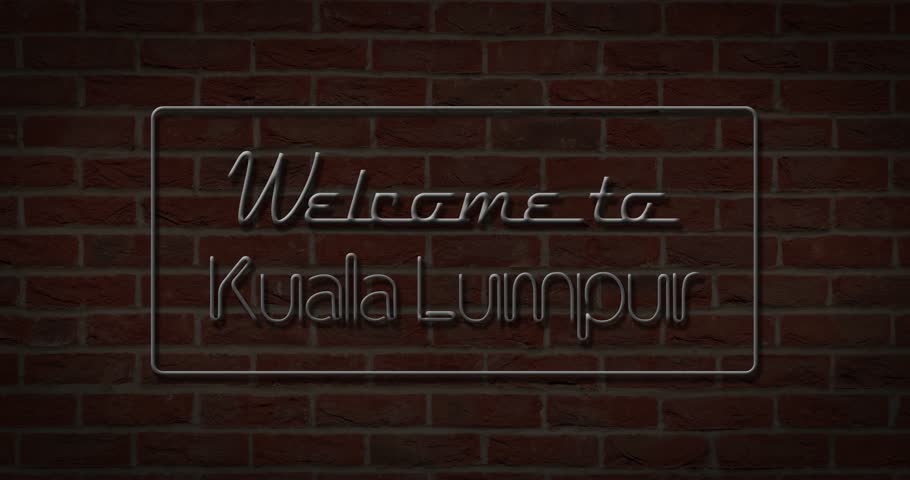 Neon text sign of Welcome to Kuala Lumpur in brick background