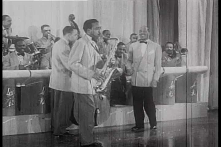 CIRCA 1948 The Andy Kirk orchestra plays on stage.