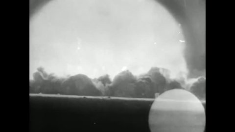 CIRCA 1940s - Atomic bomb blast footage of Hiroshima and Nagasaki in 1945.