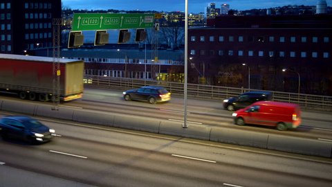 Time lapse of highway "Essingeleden" in Stockholm at dusk
