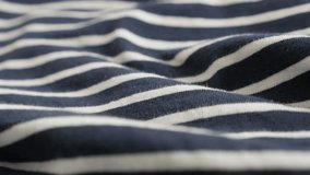 Sample of sailor marine cloth 4K 2160p 30fps UltraHD panning footage - Blue and white striped fabric close-up slow pan 3840X2160 UHD video