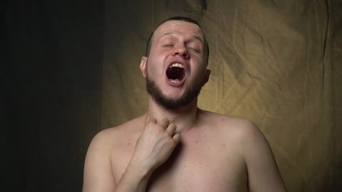 The man shows an orgasm, slow motion