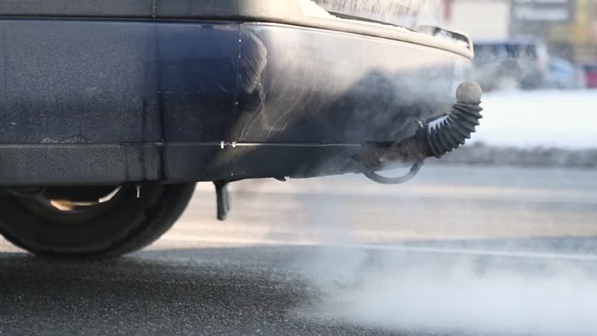 Automobile exhaust tube with gases. Enviroment pollution. slow motion | Shutterstock HD Video #1006793392