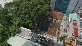HO CHI MINH CITY, VIETNAM – MAY, 2016 : Video shot of couple enjoying view from hotel on a sunny day with cityscape in view