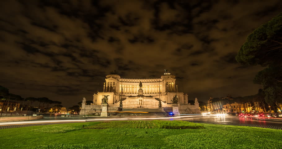 ROME, ITALY – OCTOBER 2015 : Timelapse at Vittoriano / National Monument at night with clouds and traffic movement