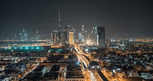DUBAI, UAE – MARCH 2016 : Timelapse transition from viewpoint at night to metro hyperlapse