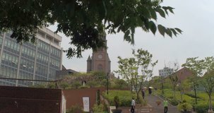 SEOUL, SOUTH KOREA – JULY 216 : Video shot of old catholic church in central Seoul on a beautiful day with trees and sky in view