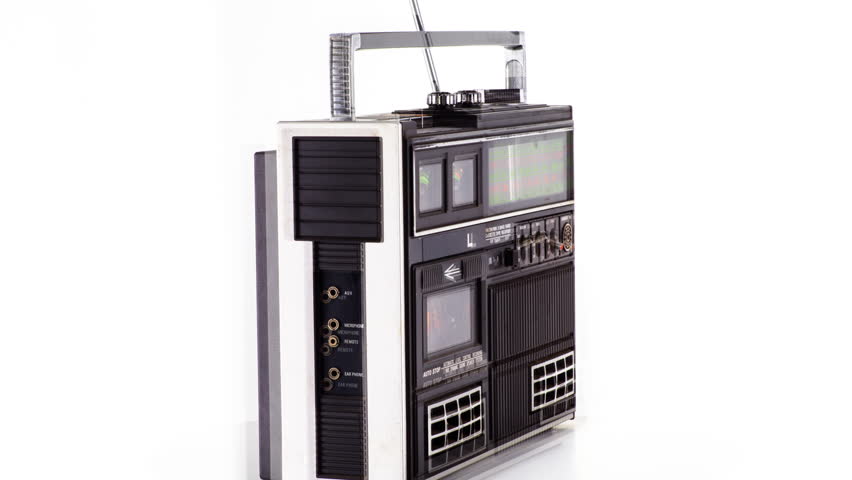 a vintage hifi ghettoblaster spinning around