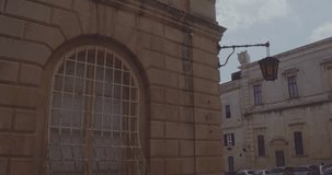 MALTA – AUGUST 2016 : Video shot of Mdina church on a beautiful day with people and old buildings in view