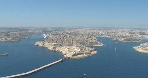 MALTA – AUGUST 2016 : Aerial shot of Valletta cityscape on a beauiful day with city walls and landscape in view