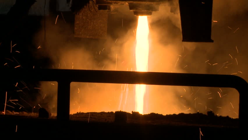 Molten metal pouring out of furnace. Liquid metal from blast furnace. Molten metal foundry. Pouring molten steel. Liquid steel pouring. | Shutterstock HD Video #1006854007
