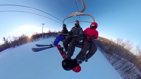 Extreme sport wide angle snowboard athlete on winter ski hill