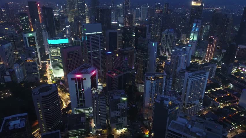 AERIAL.Top view to Kuala Lumpur city, Malaysia. Cityscape business skyscrapers night downtown. | Shutterstock HD Video #1006858945
