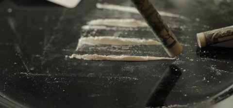 Snorting cocaine, paraphernalia, drug use