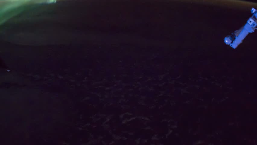 ISS view of rotating planet earth with aurora and star galaxy. Created from Public Domain images, courtesy of NASA JSC : http://eol.jsc.nasa.gov. Zoom out