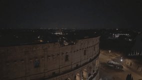 Aerial Drone footage view of Colosseum in Rome Italy by night // no video editing
