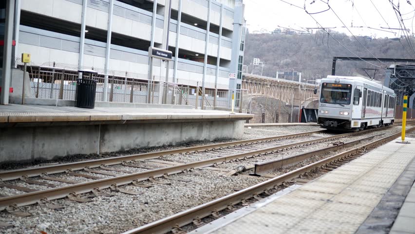 A Subway Car arrives at station on overcast morning in Pittsburgh Pennsylvania