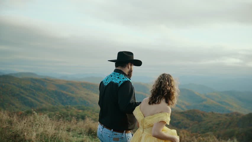 Fall on Max Patch Mountain Appalachian Mountains, Tennessee & North Carolina, young couple, woman in yellow dress, cowboy in hat 4k